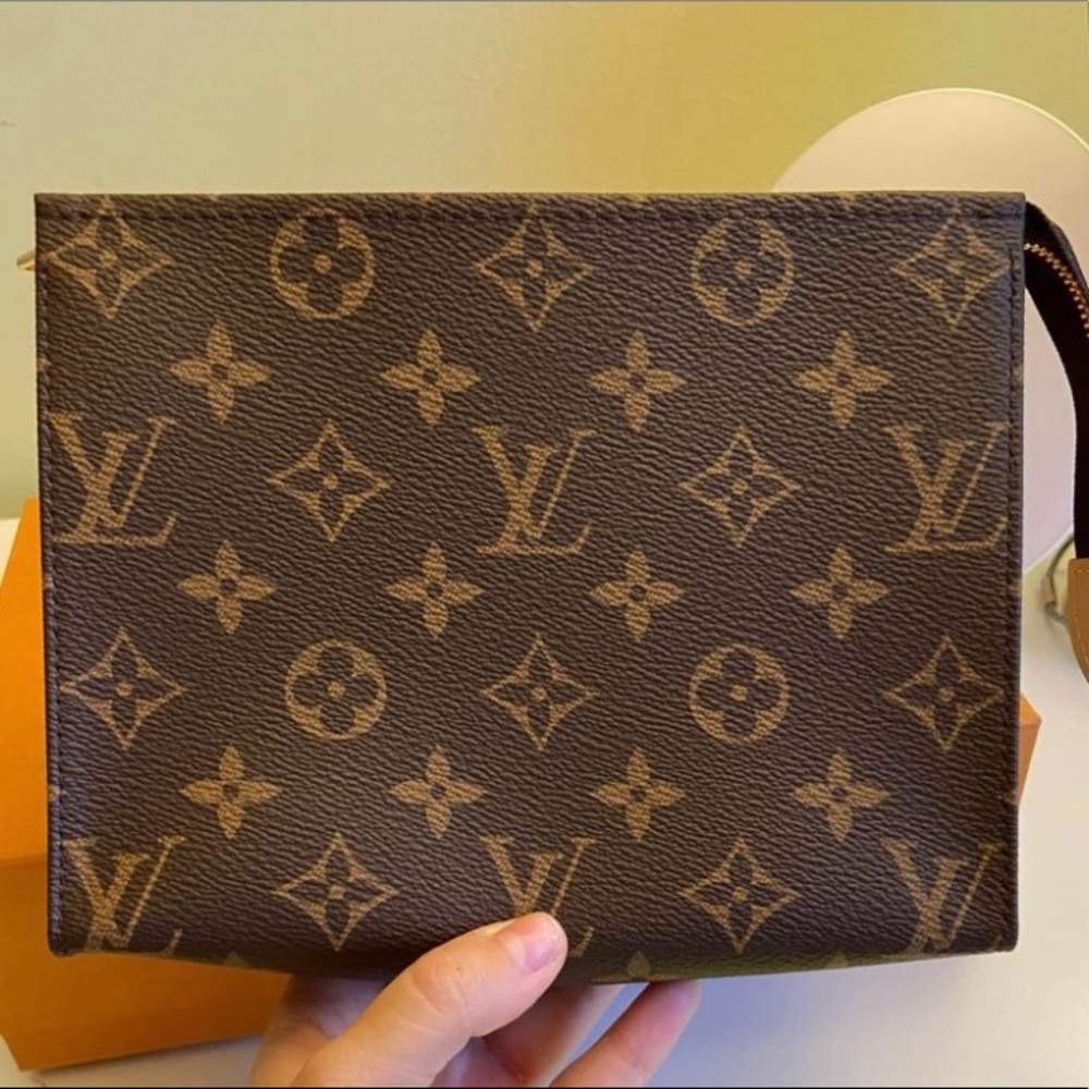 SOLD- Louis Vuitton Toiletry 19